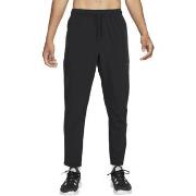 Jogging housut / Ulkoiluvaattee Nike  Unlimited Dri-FIT Tapered  EU M