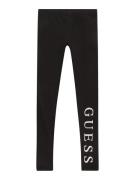 GUESS Leggingsit  musta / hopea