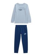 Nike Sportswear Juoksupuku 'CLUB'  vaaleansininen / tummansininen / of...