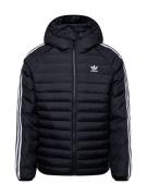 ADIDAS ORIGINALS Välikausitakki  musta / valkoinen