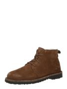 BIRKENSTOCK Nauhanilkkurit 'Uppsala Mid Shearling LEVE'  konjakki