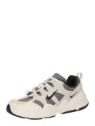 Nike Sportswear Matalavartiset tennarit 'TECH HERA'  beige / tummanhar...