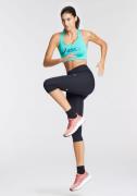 ASICS Urheiluhousut 'ROAD'  musta / valkoinen