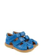 Classic Rub Sole Closed Two Velcro Blue Pom Pom