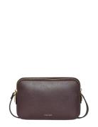 Foil Logo Elongated Camera Bag Brown Calvin Klein