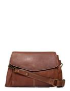 Liri Big Brown RE:DESIGNED EST 2003