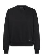 A- Ls Badge Logo Terry Crew Nk Black Calvin Klein Jeans