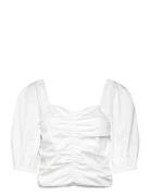 Daria Blouse White Twist & Tango
