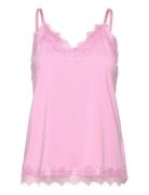 Top From Freequent In A Light Material. The Top Has A Simple Silhouett...