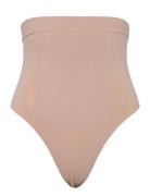 Extra Firm Seamless Thong Stringit Alusvaatteet Beige Calvin Klein