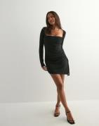 Nelly - Musta - Fancy Asymmetric Dress